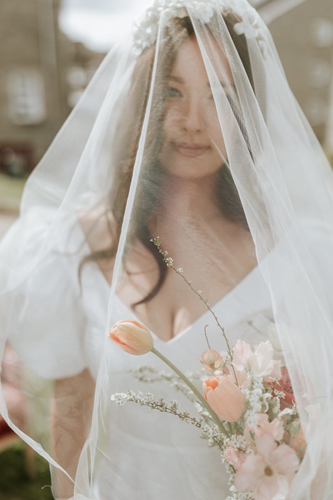 Bride with Vale and Flowers