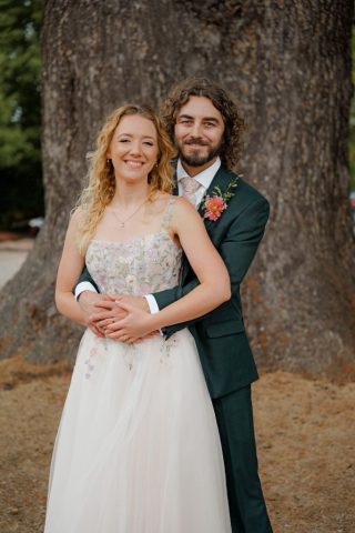 Smiling wedding couple in Herefordshire