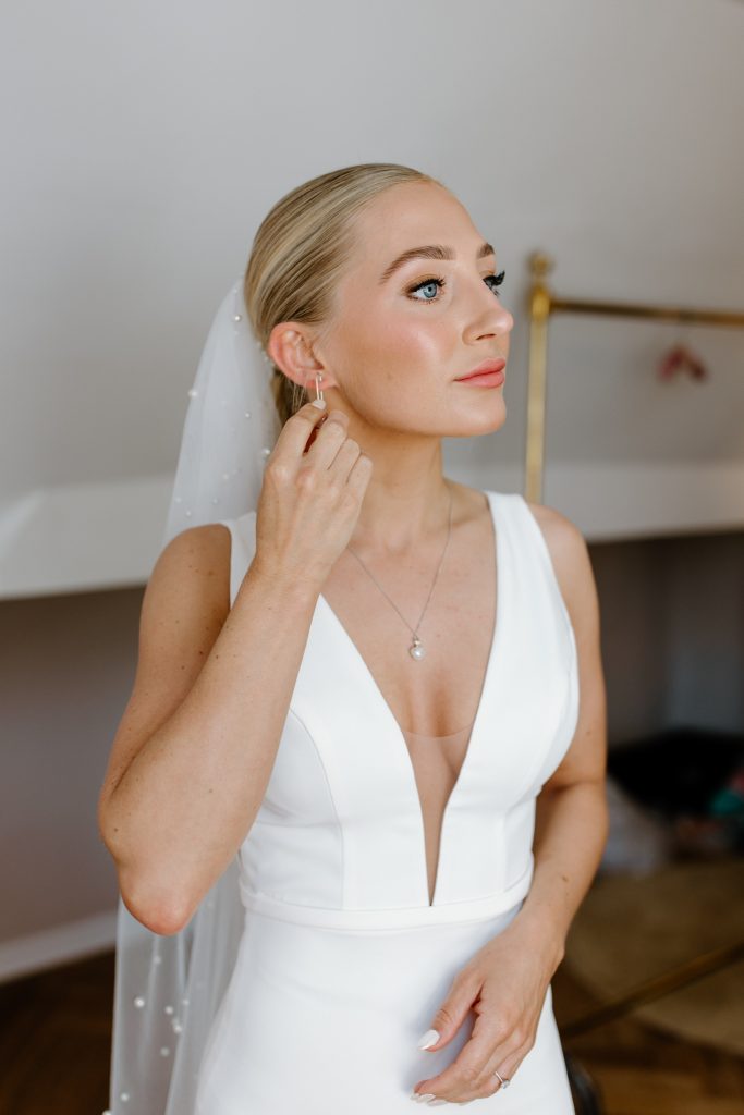 Finishing touches with bride, Hampshire